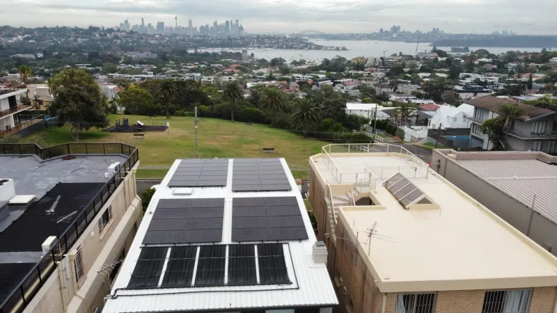 Aerial view of a large solar system on a roof in Dover Heights