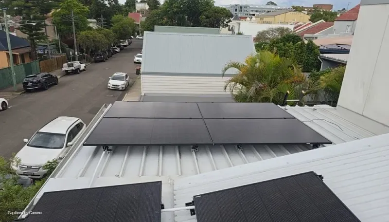 New solar panels on a roof above a Leichhardt street
