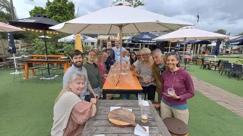 Volunteers around a table at the end-of-year party